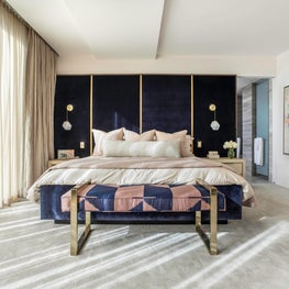 Portfolio: Jewel-toned master bedroom with blue headboard and neutral accents