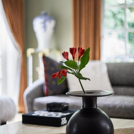 Living Room with Vase and Flower Vignette