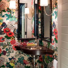 Tiny Powder Room with Wallpaper and Sconces with Shades