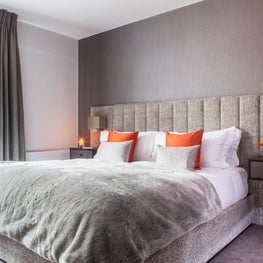 Master bedroom, Butlers Wharf London, with bespoke upholstered headboard