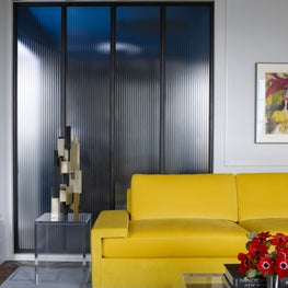 Central Park Apartment, Variegated Glass Walls, Yellow Sofa, Modern Art