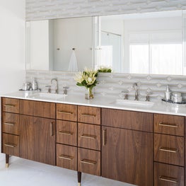 Portfolio: Luxurious master bathroom vanity with wood cabinets