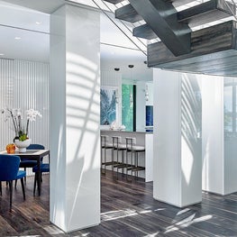 Minimalist color palette in white blend with mid-century modern furnishings 