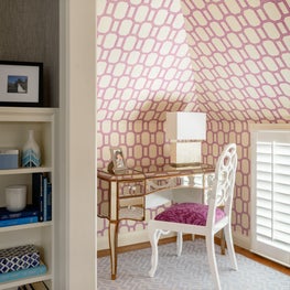 Small vanity room off the Master dressing room with bright pink wallpaper