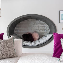 Chic, cozy, and complete with an under the stairs reading nook, this kiddos lounge is ready for endless after-school fun.