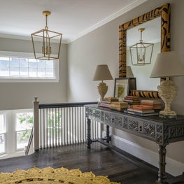 Foyer with Tiger Stripe Mirror, Antique Console Table and Round Jute Rug