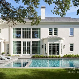 Complete with a pool and veranda, Colonial Drive's backyard is the perfect venue for summer gatherings with family and friends!