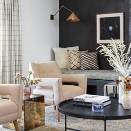 Corner Reading Nook with Plaster Wall & Wicker Sconce