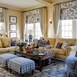A fun play on modern and traditional design comes together in this textile-rich family room.