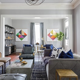 Uptown New Orleans Family Room with layered seating and mix of textiles 