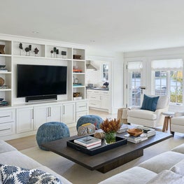 Family Room, Neutral Palette, Blue Hues, Built-In Shelving, Poufs, Blue Pillows — Pine Lake Project