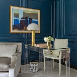 Home Workspace and Living Room with Blue Walls and Picture Frame Moulding