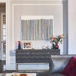 Living room detail console table with art