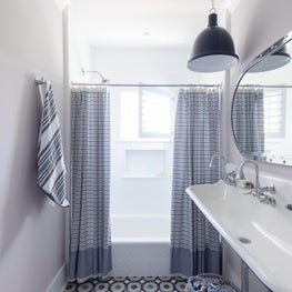 Navy and blue tile in a beach house bathroom