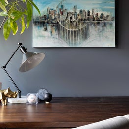 Portfolio: A handsome writing desk and painting in a Houson bedroom