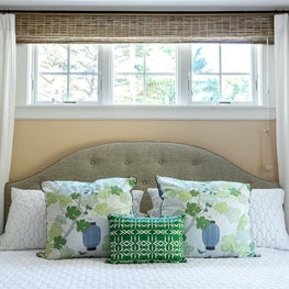 Traditional Maine summer cottage bedroom with peach walls