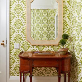 Ikat wallpaper with vintage entryway console table