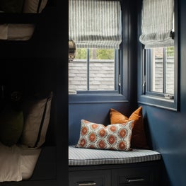 The second floor addition that extends over the original hunting lodge allowed us to create two new bedrooms for our client's sons.