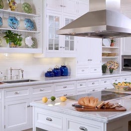 The kitchen was kept clean with an emphasis on transitional style.