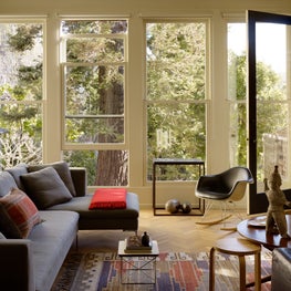 Living room with floor to ceiling windows