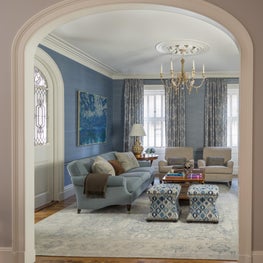 Beacon Hill Family Room with Arched Doorway and Swedish Chandelier