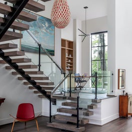 Portfolio: Floating staircase that leads to a mid level study