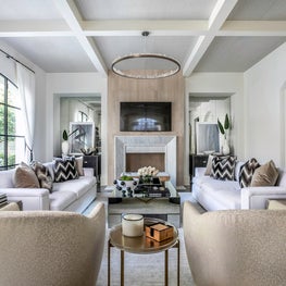 Portfolio: A coffered ceiling draws the eye upward in this symmetrical living room designed by Laura U.