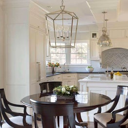 Open Kitchen & Dining Area with White Cabinetry