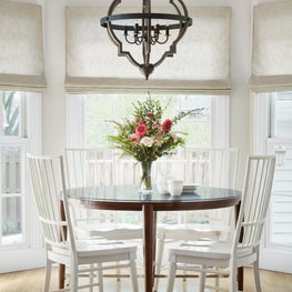 LaGrange, Kitchen nook with oversize chandelier and custom window treatments