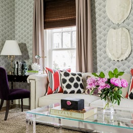 Layered living room chesterfield wallpaper tortoise shell lucite coffee table 