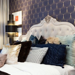 Grand Master Bedroom with custom gold foiled wallpaper - pile on the pillows.