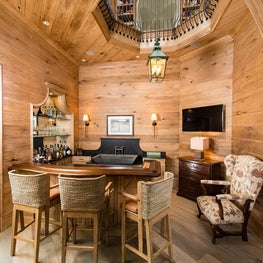 Wet Bar with Horizontal Butternut Boards and Opening Above