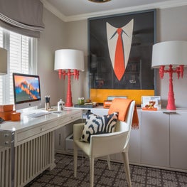 Office Space with Neutral Walls, Large Bright Pink Lamps and Suit and Tie Print