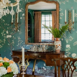Traditional Dining room adorned with Chinoiserie wallpaper