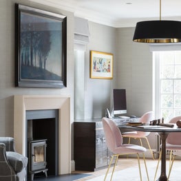 Home office/ library with textured grasscloth wallcovering, limestone fireplace 