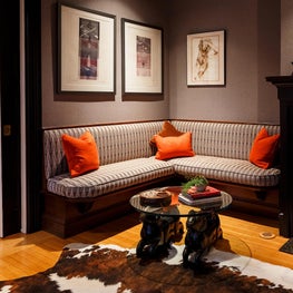 Bar w/ built-in bench, hide rug, vintage ram base coffee table - Sophia Shible