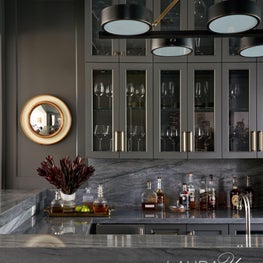 We are of the opinion that every custom home should include a handsome bar like this one.
