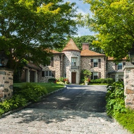 The entrance gates to an updated Main Line manor house.