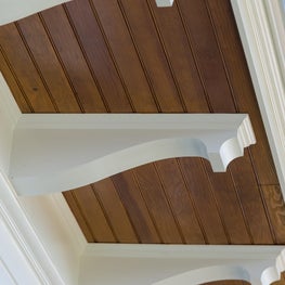 Deep Natural Fir Bead Board Soffit with White Brackets