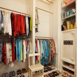 Hanging Storage Solutions and a custom safe in an oceanfront residence 