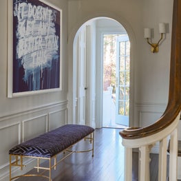 Modern Entry with Contemporary Art and Gold Leaf Bench