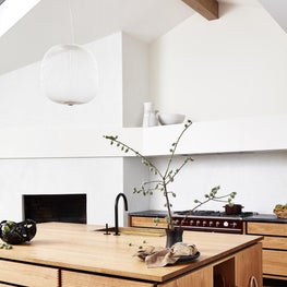 Soulful Home Kitchen with Garde Hvalsøe cabinets, Foscarini Spokes 2 pendant