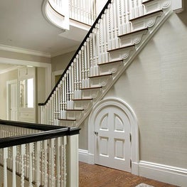 Historic Home Staircase with Animal Print Area Rug