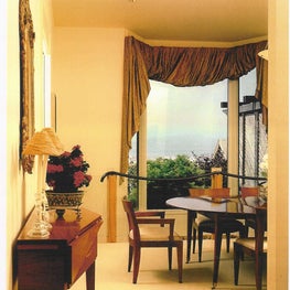 San Francisco, CA - Dining Room: 18th century table set, contemporary chairs, artisan made sideboard, hand wrapped silk window fabric 