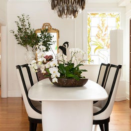 Portfolio: Contemporary Dining with classical elements in a monochromatic setting