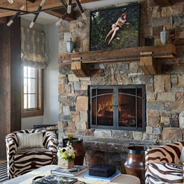 Montana Mountain Retreat Game Room with a pair of Hair on hide Swivel Chairs