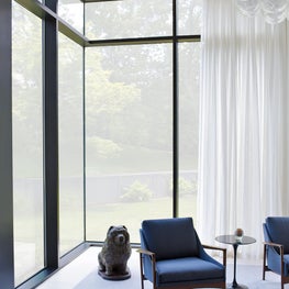 Large scale modernist windows in living room
