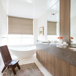 Portfolio: Indo-Asian Inspired High-Rise, Bathroom with gorgeous rug and lovely soaker tub