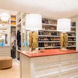 Seattle. Dressing Room with custom island and vintage Murano glass lamps.