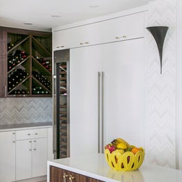 Detail shot of custom wine rack and fridge 